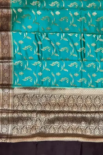 Banarasi  pure silk chiniya saree in contrast shade of teal green & black colour with floral  zari work