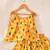 Yellow silk printedtop with lehenga