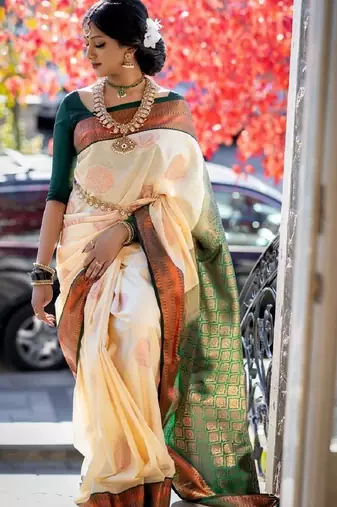 Cream green silk blend banarasi saree with unstitched blouse piece