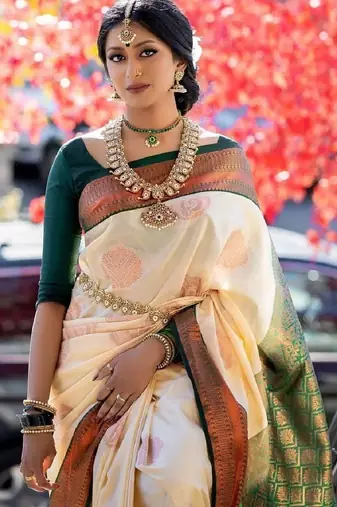 Cream green silk blend banarasi saree with unstitched blouse piece
