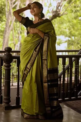 Parrot green silk blend banarasi saree with unstitched blouse piece