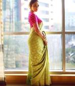 Parrot pink silk blend banarasi saree with unstitched blouse piece