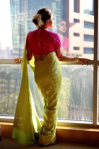 Parrot pink silk blend banarasi saree with unstitched blouse piece