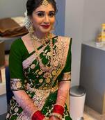 Green silk blend banarasi saree with unstitched blouse piece