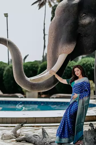 Blue green silk blend banarasi saree with unstitched blouse piece