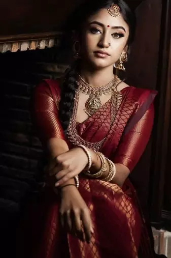 Maroon silk blend banarasi saree with unstitched blouse piece