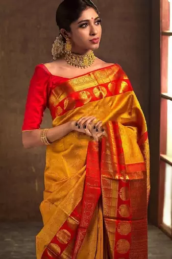 Yellow red silk blend banarasi saree with unstitched blouse piece