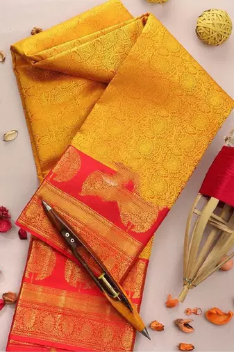 Yellow red silk blend banarasi saree with unstitched blouse piece