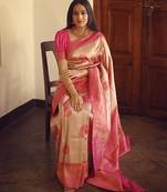 Baby pink silk blend banarasi saree with unstitched blouse piece