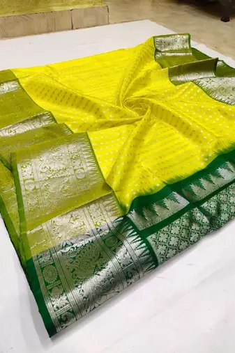 Yellow green soft silk blend banarasi jacuard work designer party wear saree with unstitched blouse piece