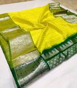 Yellow green soft silk blend banarasi jacuard work designer party wear saree with unstitched blouse piece