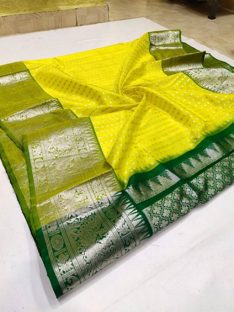 Yellow green soft silk blend banarasi jacuard work designer party wear saree with unstitched blouse piece