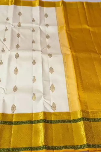 White yellow silk blend banarasi saree with unstitched blouse piece