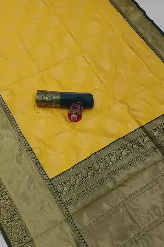 Yellow green silk blend banarasi saree with unstitched blouse piece