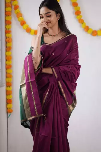 Rani green linen blend banarasi saree with unstitched blouse piece