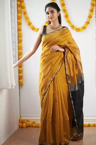Yellow black linen blend banarasi saree with unstitched blouse piece