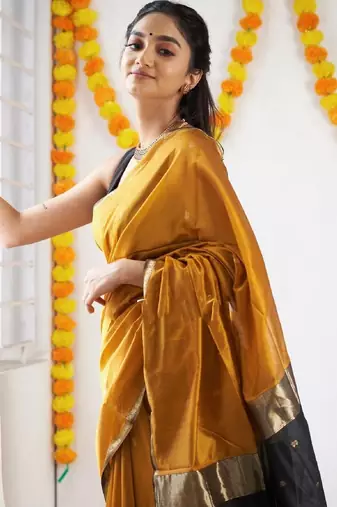 Yellow black linen blend banarasi saree with unstitched blouse piece