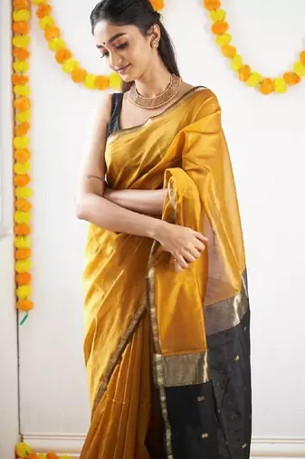 Yellow black linen blend banarasi saree with unstitched blouse piece