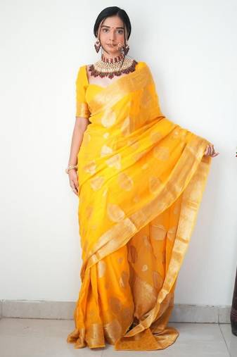 Yellow soft linen blend banarasi jacuard work designer party wear saree with unstitched blouse piece