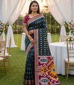 Teal soft  saree with zari weawing meenakari rich pallu and unique ikkat border