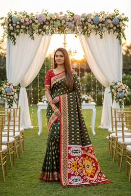 Green soft saree with zari weawing meenakari rich pallu and unique ikkat border 1