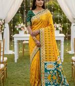 Yellow soft  saree with zari weawing meenakari rich pallu and unique ikkat border