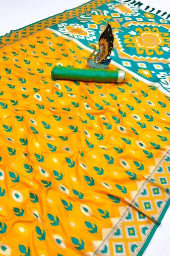 Yellow soft saree with zari weawing meenakari rich pallu and unique ikkat border