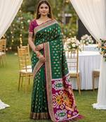 Green soft  saree with zari weawing meenakari rich pallu and unique ikkat border