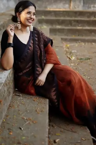 Orange black linen blend banarasi saree with unstitched blouse piece