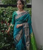 Turquoise green linen blend banarasi saree with unstitched blouse piece