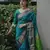 Turquoise green soft linen blend banarasi jacuard work designer party wear saree with unstitched blouse piece