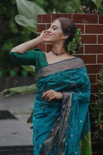 Turquoise green linen blend banarasi saree with unstitched blouse piece