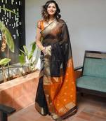 Black orange linen blend banarasi saree with unstitched blouse piece