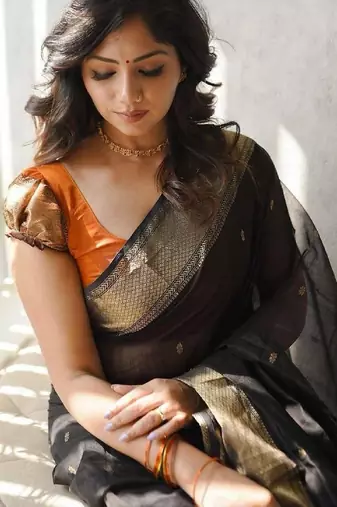 Black orange linen blend banarasi saree with unstitched blouse piece