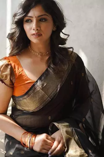 Black orange linen blend banarasi saree with unstitched blouse piece