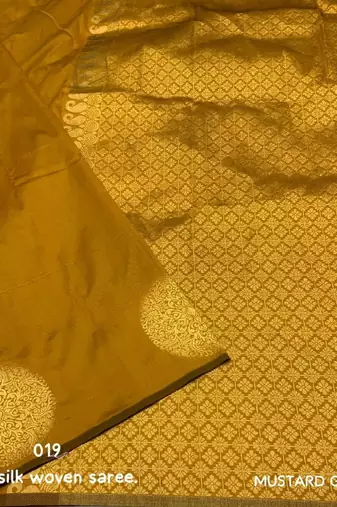 Yellow silk blend banarasi saree with unstitched blouse piece