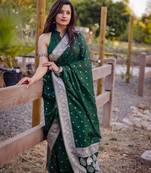 Green silk blend banarasi saree with unstitched blouse piece