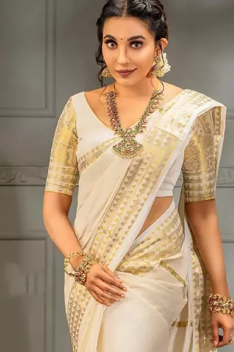 Off white soft silk blend banarasi jacuard work designer party wear saree with unstitched blouse piece