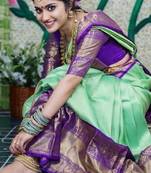 Pista green silk blend banarasi saree with unstitched blouse piece