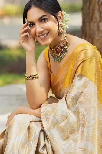 Off white soft silk blend banarasi jacuard work designer party wear saree with unstitched blouse piece