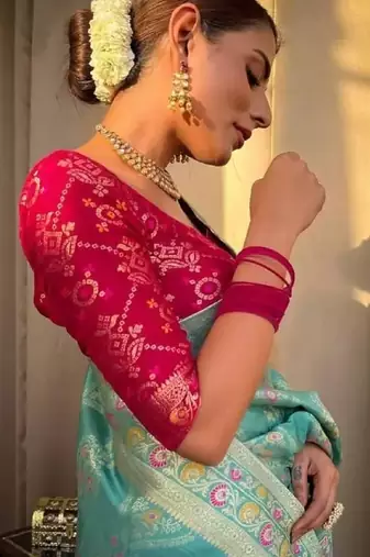 Turquoise pink silk blend banarasi saree with unstitched blouse piece