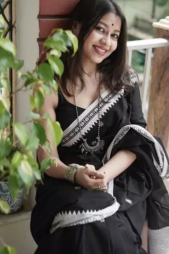 Black linen blend banarasi saree with unstitched blouse piece