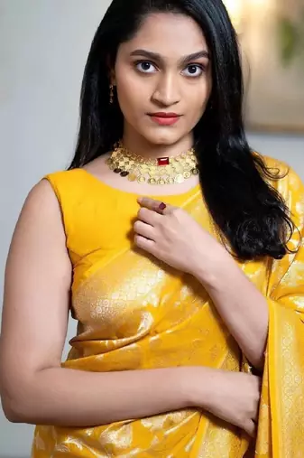 Yellow linen blend banarasi saree with unstitched blouse piece