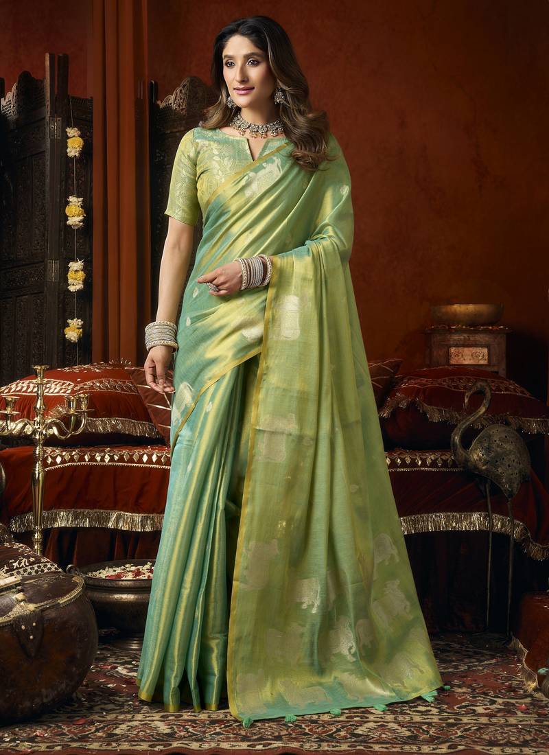 Heavy tissue saree with allover cow butta design & fancy tassels