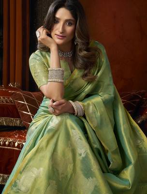 tissue saree with allover cow butta design & fancy tassels 2