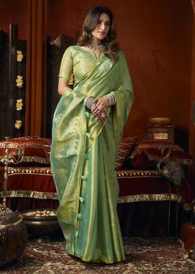  tissue saree with allover cow butta design & fancy tassels 3