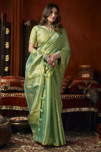  tissue saree with allover cow butta design & fancy tassels