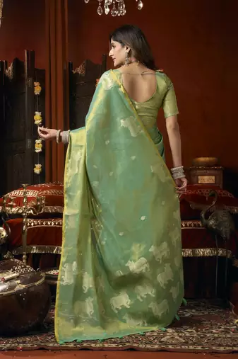  tissue saree with allover cow butta design & fancy tassels