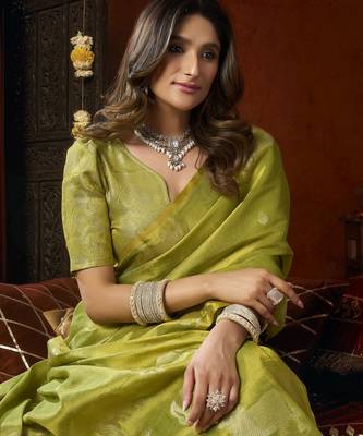  tissue saree with allover cow butta design & fancy tassels 2