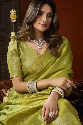  tissue saree with allover cow butta design & fancy tassels